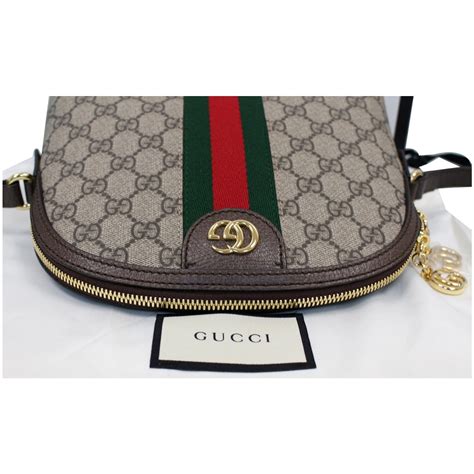 499621 gucci|Ophidia small shoulder bag in Beige GG Canvas .